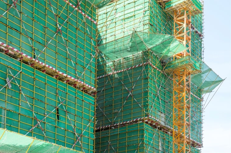 A Construction Site Enveloped by Green Safety Nets
