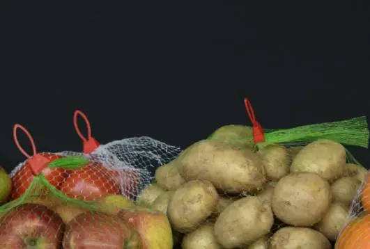 potatoes and apples packaged in breathable mesh net bags
