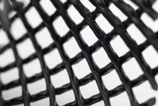 Close-up view of plastic net pipe showing high-strength grid structure