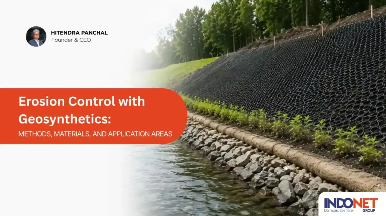 Realistic erosion control project using geosynthetics on a stabilized riverbank with geogrid, riprap, vegetation, and slope protection systems.
