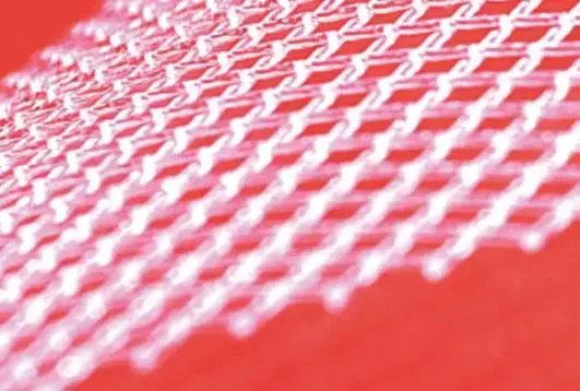 white filtration net with a diamond-weave pattern, set against a bright red background