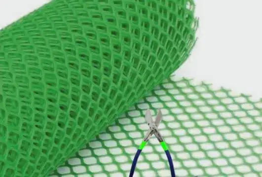 roll of green plastic mesh netting, commonly used for making DIY tree guards and protecting saplings.
